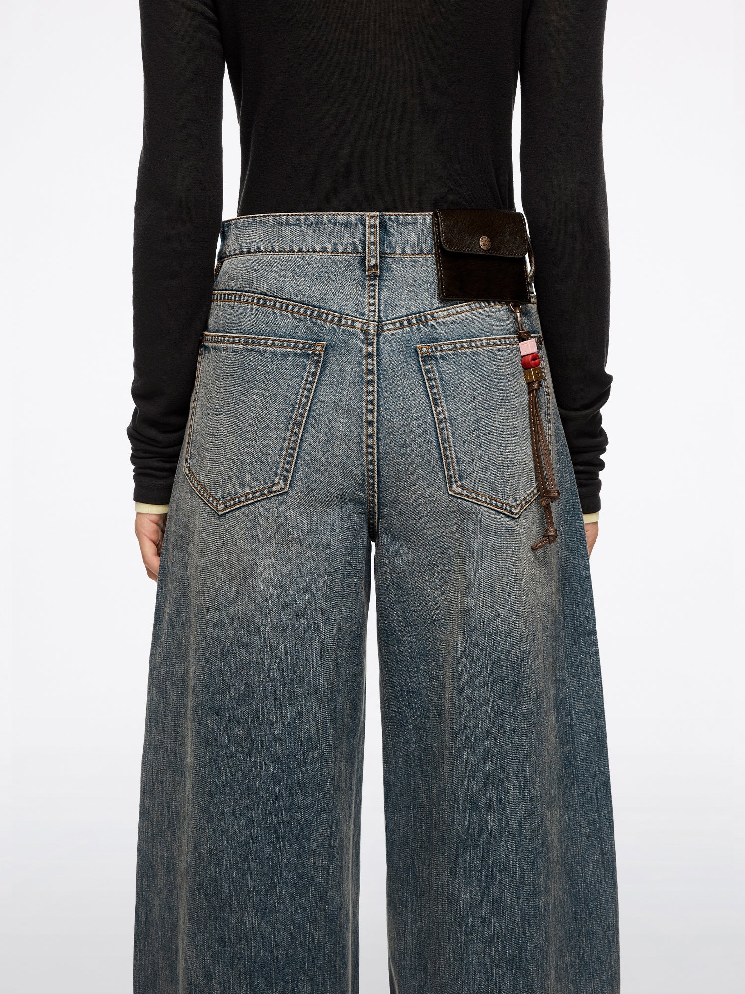 Scimitar Jeans With Decorative Accessory