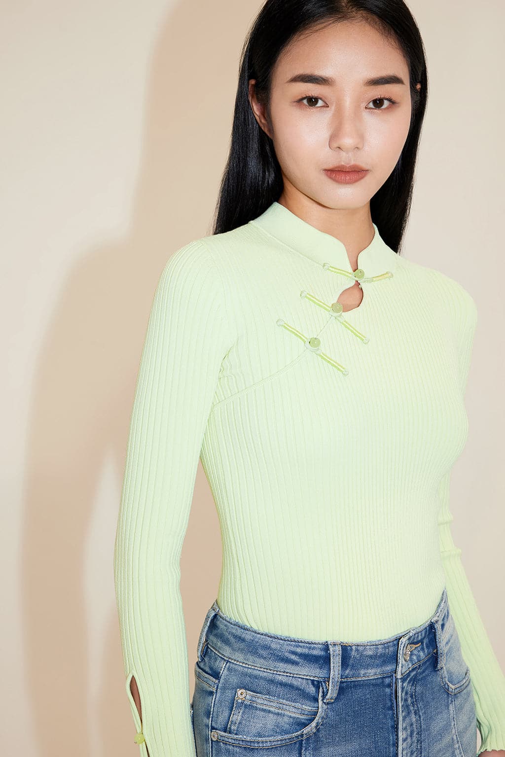 Knitted Sweater With Button Design